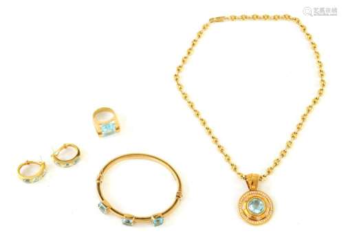 AN 18CT GOLD AND AQUAMARINE FOUR PIECE SUITE OF EVENING JEWE...