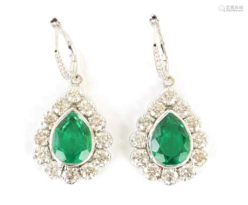 A FINE AND LARGE PAIR OF 18CT WHITE GOLD DIAMOND AND EMERALD...