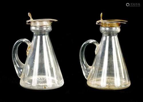 A PAIR OF GEORGE V SILVER MOUNTED MINIATURE WHISKEY DECANTER...