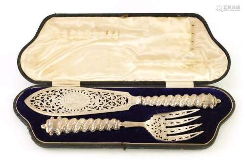 A FINE VICTORIAN CASED PAIR OF SILVER FISH SERVERS