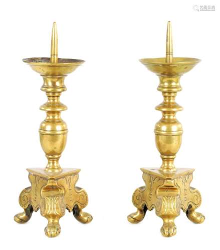 A PAIR OF 17TH/18TH CENTURY CONTINENTAL CAST BRASS PRICKET C...