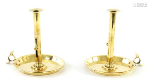 A PAIR OF GEORGE III OVERSIZED REFECTORY BRASS CANDLESTICKS