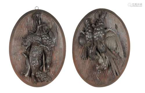 AN PAIR OF LATE 19TH CENTURY CARVED BLACK FOREST WALL PLAQUE...