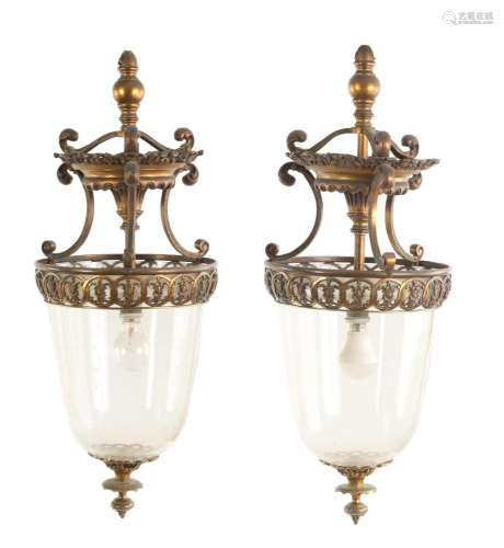 A PAIR OF EARLY 20TH CENTURY GILT BRASS HANGING LANTERNS