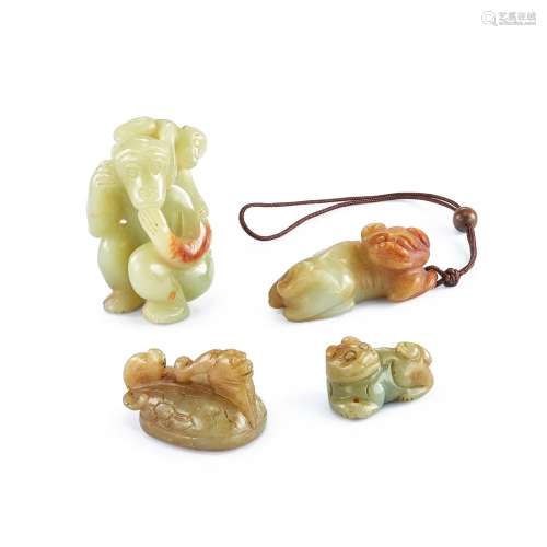 Four celadon and russet jade animal carvings, Ming dynasty o...