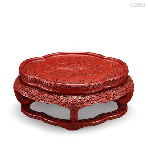 A cinnabar lacquer quatrelobed 'lotus' stand, Qing d...