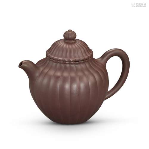 A Yixing 'chrysanthemum' teapot and cover, Late Qing...