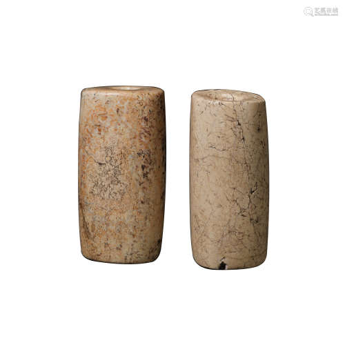 A PAIR OF CHINESE HONGSHAN CULTURE CHICKEN BONE AND WHITE JA...