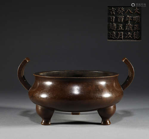 In the Ming Dynasty, the bronze two ear three foot censer