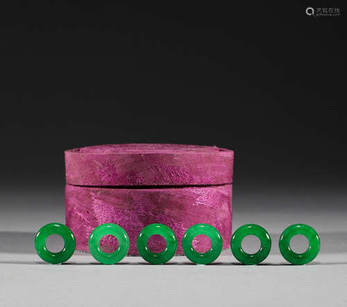 In the Qing Dynasty, a group of jadeite rings