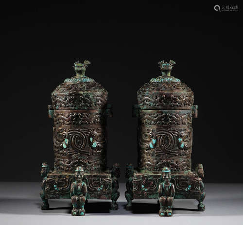 During the Shang and Zhou dynasties, bronze ritual vessels i...