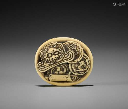 EISAI: A WALRUS IVORY RYUSA MANJU NETSUKE OF ONIGAWARA