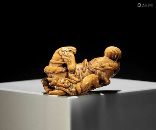 GENRYOSAI MINKOKU I: A RARE IVORY NETSUKE OF A HORSE AND GRO...