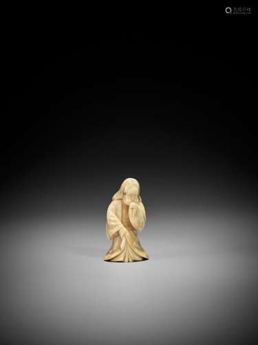 A MARINE IVORY NETSUKE OF OKAME