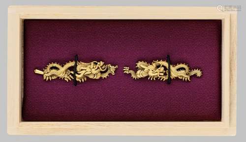 A PAIR OF GILT SILVER GOTO SCHOOL DRAGON MENUKI