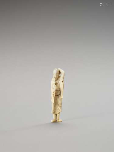 A TALL IVORY NETSUKE OF A SAGE WITH SCEPTER AND HOSSU