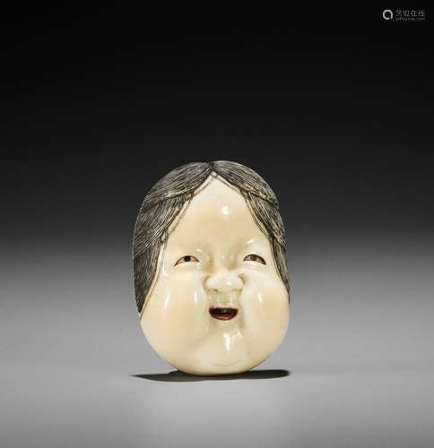 KOGYOKU: A FINE IVORY MASK NETSUKE OF OKAME