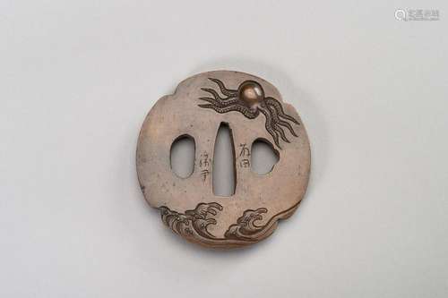 A COPPER TSUBA WITH OCTOPUS AND WAVES