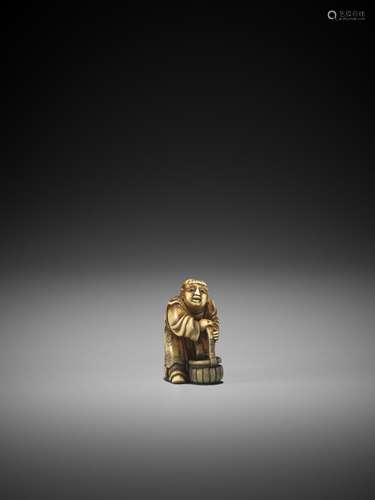 OKAMOTO GARAKU: AN IVORY NETSUKE OF A BOY WITH BASKET