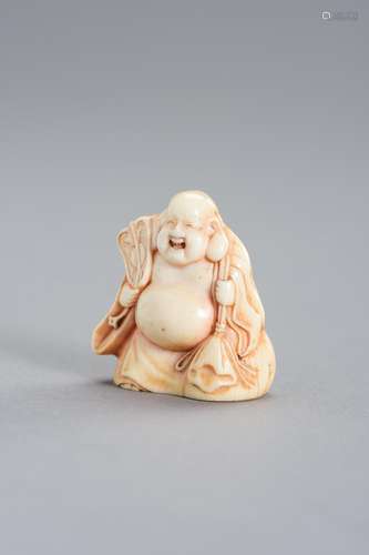 UEDA KOHOSAI: AN IVORY NETSUKE OF A BIZEN WARE CERAMIC MODEL...