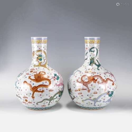 PAIR YONGZHENG FAMILLE ROSE DRAGON CELESTIAL VASES