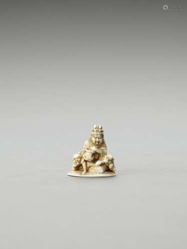 GYOKUSAI: AN IVORY NETSUKE OF EMMA-O FEEDING TWO ONI