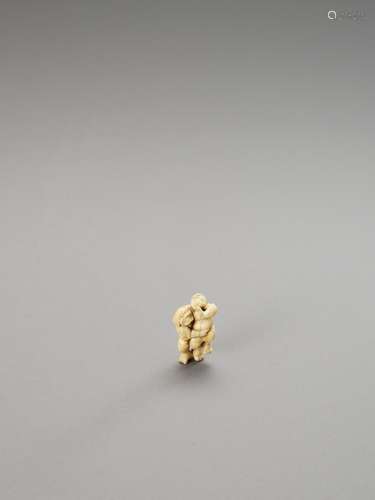 AN IVORY NETSUKE OF TWO SUMO WRESTLERS