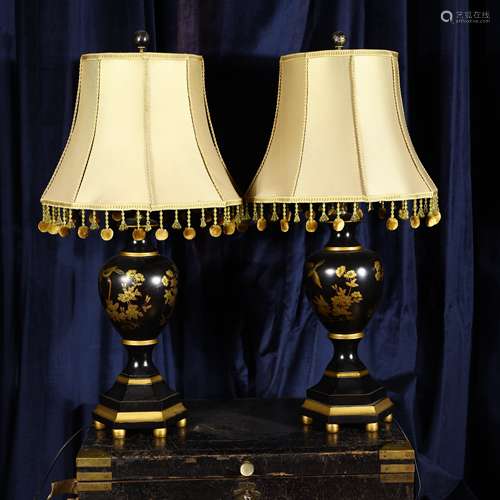 A pair of lacquerware golden table lamps