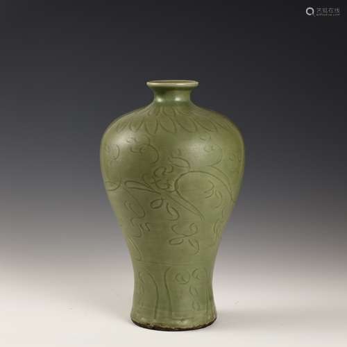 Celadon carved plum bottle