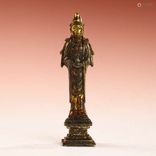 Ancient bronze gilded Buddha