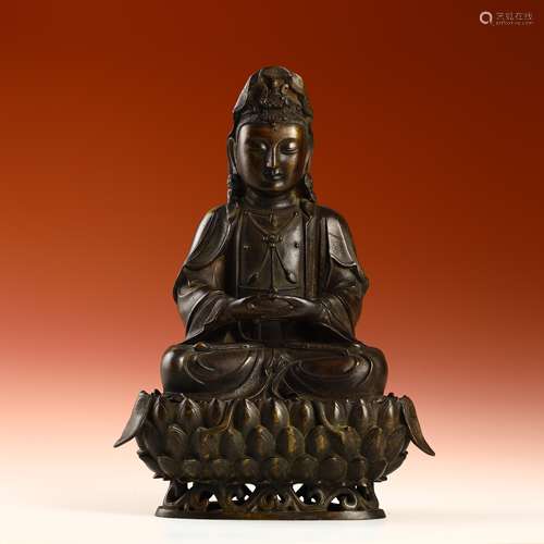 Ancient and gold and bronze Guanyin statues