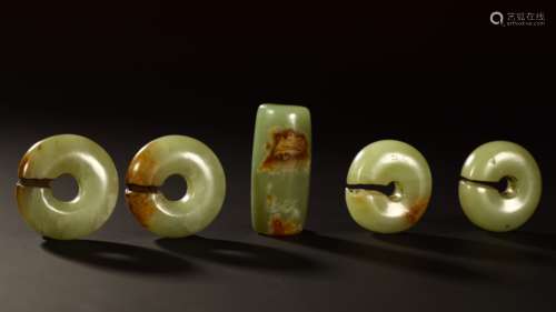 A group of ancient jade accessories