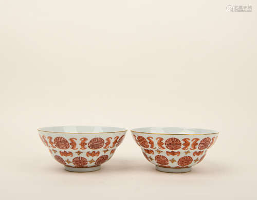 A PAIR OF GILT-DECORATED IRON-RED BOWLS, DAOGUANG MARK