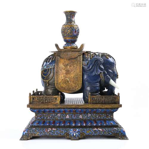 A GILT-BRONZE AND LAPIS LAZULI MODEL OF ELEPHANT AND BASE