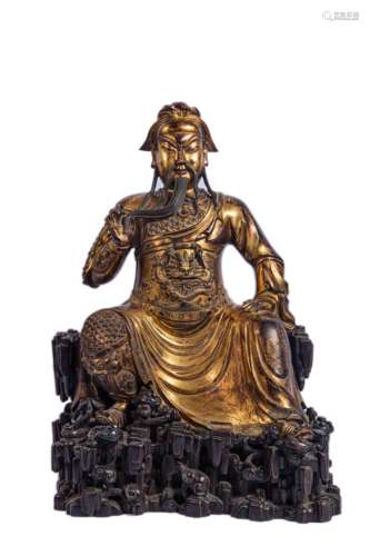 A GILT-BRONZE FIGURE OF GUANGONG WITH STAND