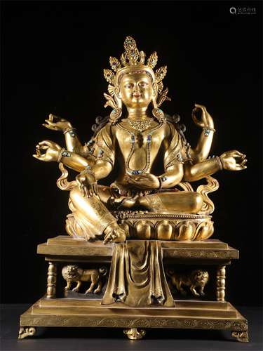 A GILT-BRONZE FIGURE OF GUANYIN