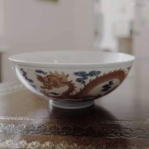 A CHINESE BLUE AND WHITE DRAGON BOWL WITH ‘DAO GUANG’ MARK