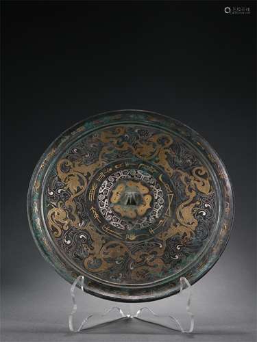 A GILT AND SILVER INLAID BRONZE MIRROR