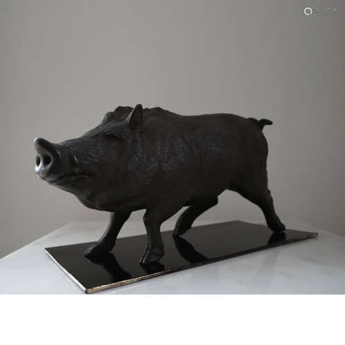 A JAPANESE BRONZE BOAR STATUE