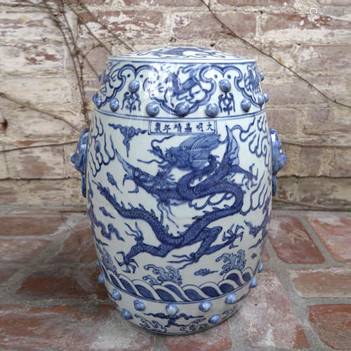 A CHINESE BLUE AND WHITE DRAGON DRUM STOOL WITH ‘JIA JING’ M...