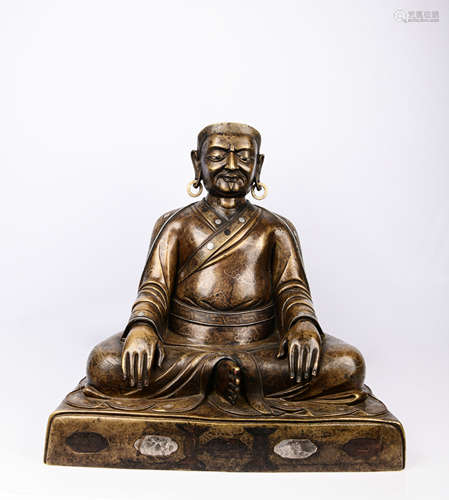 A BRONZE FIGURE OF BUDDHA