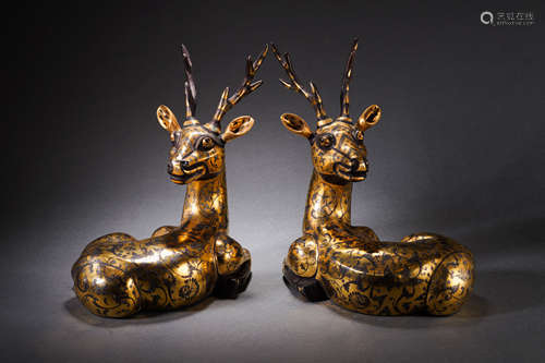 A Pair of Bronze and Guilding Deers