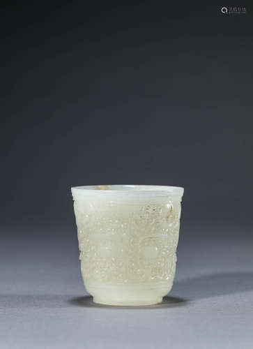 A Chinese Jade Tao Tie Mask Cup