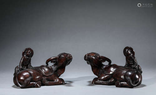 A Pair of Chinese Sandal Wood Child and Bull