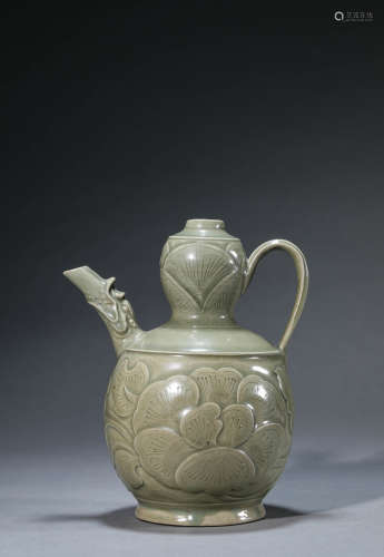 A Chinese Porcelain Yao-Type Carved Kettle