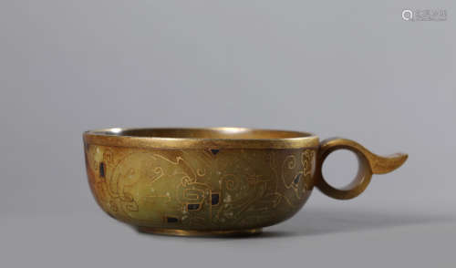 A Chinese Jade and Gold Inlaid Tao Tie Mask Cup