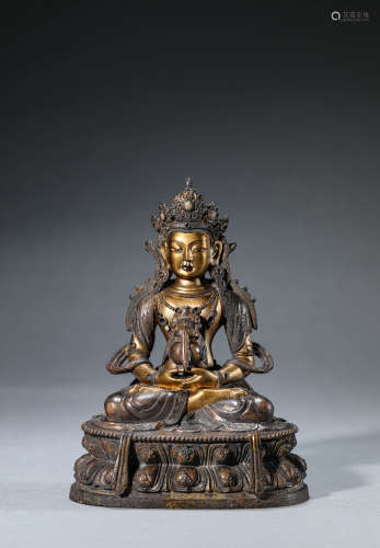 A Chinese Gold Painted Bronze Amitayus Statue