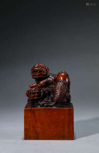 A Chinese Red Wood Lion Seal