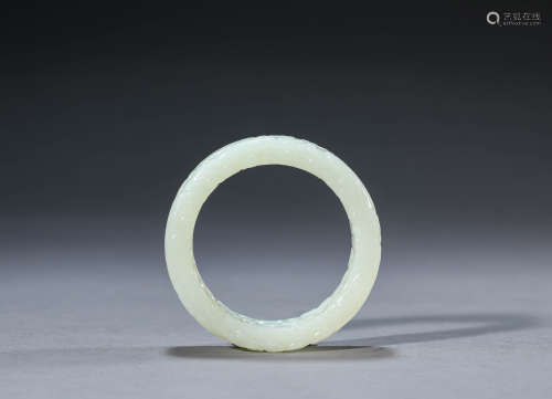 A Chinese Jade Carved Dragon Bracelet