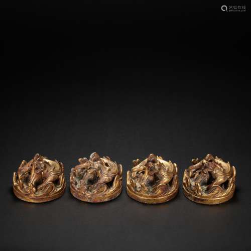 A SET OF CHINESE BRONZE GILT PAPERWEIGHTS, HAN DYNASTY